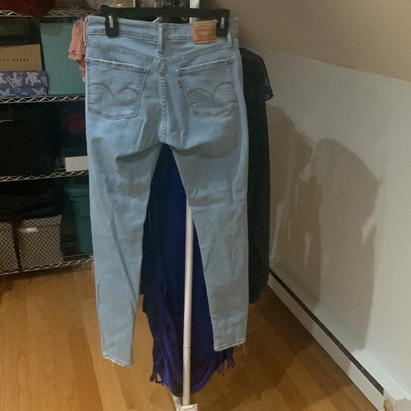 Levi’s 710 super skinny jeans. Distressed and light wash. Size 27 - Picture 2 of 4